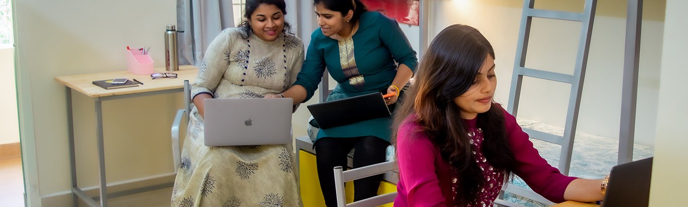 Students working on a laptop